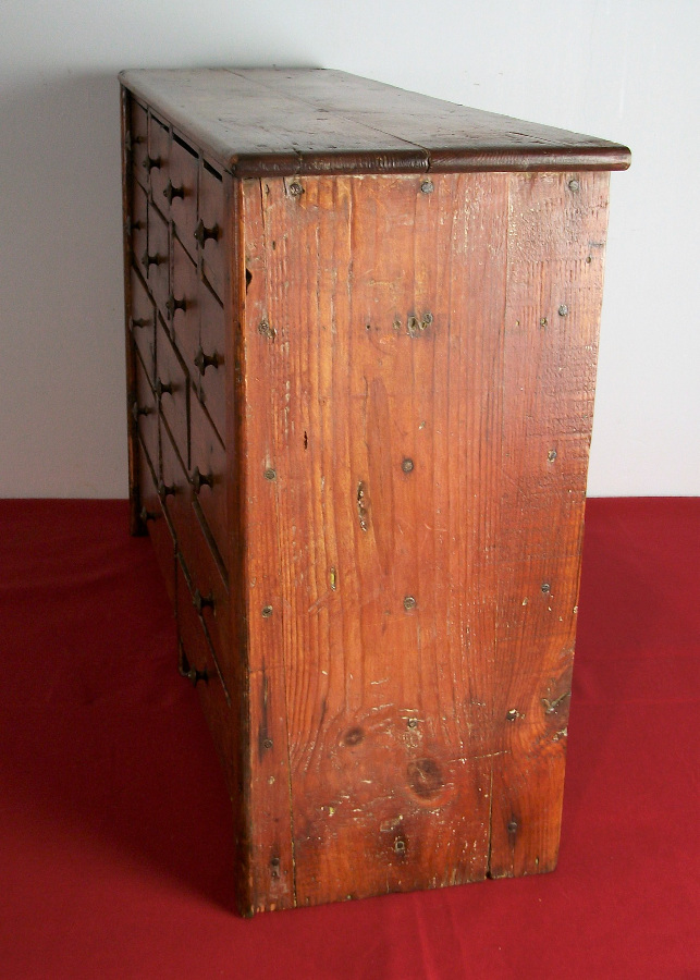  	A Collectors cabinet of 16 Drawers dated 1910